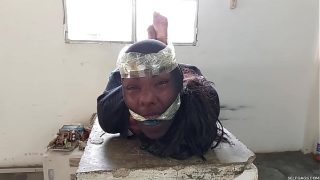 Ebony Female Trickster Gagged In Strict Hogtie With Insane Pantyhose Encasement