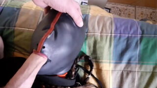 Hogtied on a bed on sexy clothes blindfolded had to suck a fat cock
