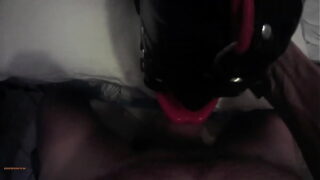 Hot babe Laura hogtied and hooded with a lip open mouth gag has her throat